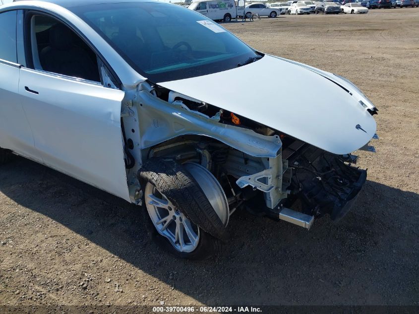 2023 Tesla Model Y Awd/Long Range Dual Motor All-Wheel Drive VIN: 7SAYGDEEXPA063631 Lot: 39700496