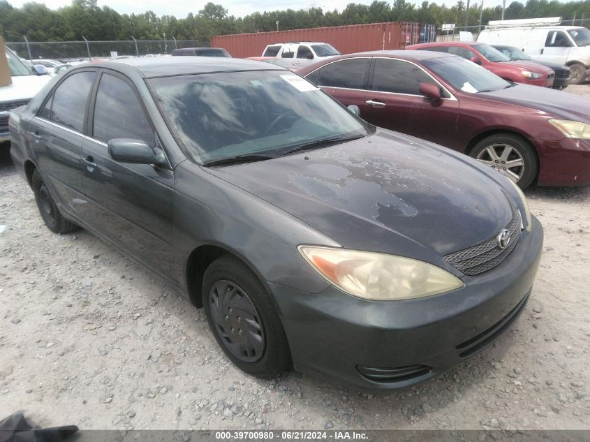 2003 Toyota Camry Le VIN: JTDBE32K630182673 Lot: 39700980