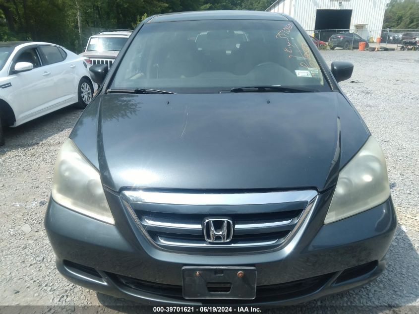 2005 Honda Odyssey Lx VIN: 5FNRL38295B119910 Lot: 39701621