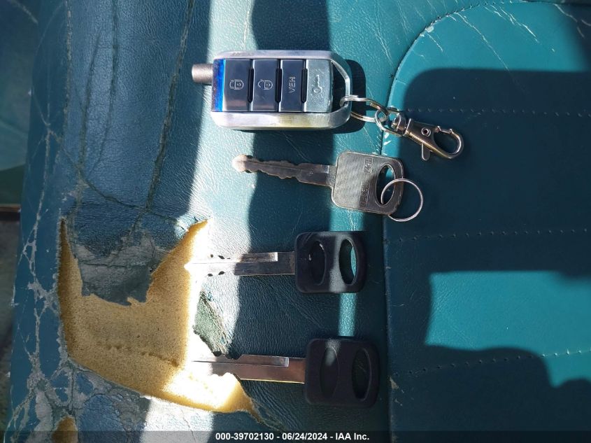 1995 Ford Econoline E150 Van VIN: 1FDEE14H1SHB63561 Lot: 39702130