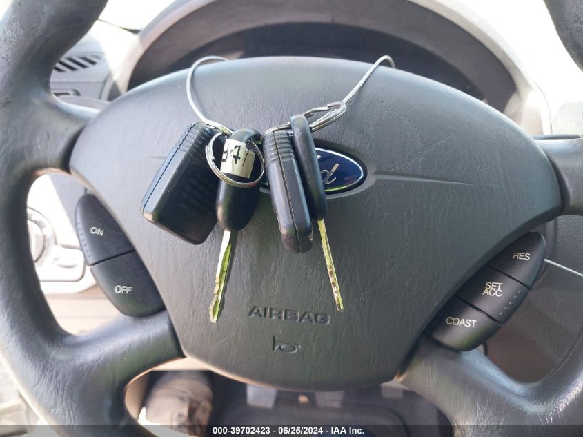 2007 Ford Focus S/Se/Ses VIN: 1FAFP34NX7W355638 Lot: 39702423