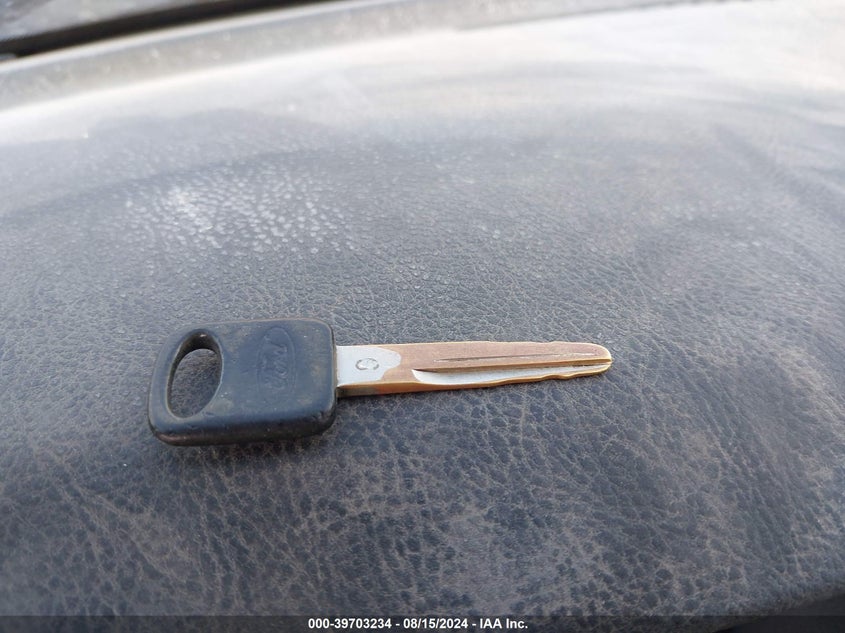 2003 Ford F-250 VIN: 1FTNF21LX3EB86016 Lot: 39703234