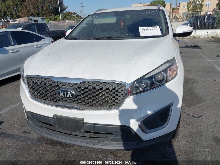 2018 Kia Sorento 2.4L Lx VIN: 5XYPG4A31JG343471 Lot: 39703450