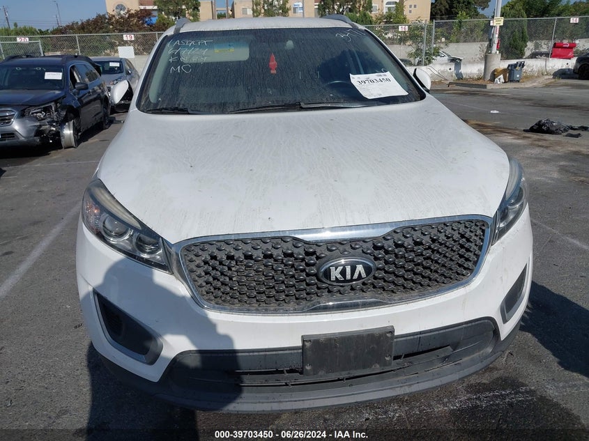 2018 Kia Sorento 2.4L Lx VIN: 5XYPG4A31JG343471 Lot: 39703450