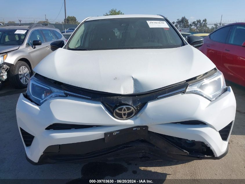 2017 Toyota Rav4 Le VIN: JTMZFREVXHJ148726 Lot: 39703630