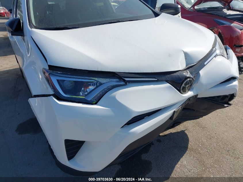 2017 Toyota Rav4 Le VIN: JTMZFREVXHJ148726 Lot: 39703630