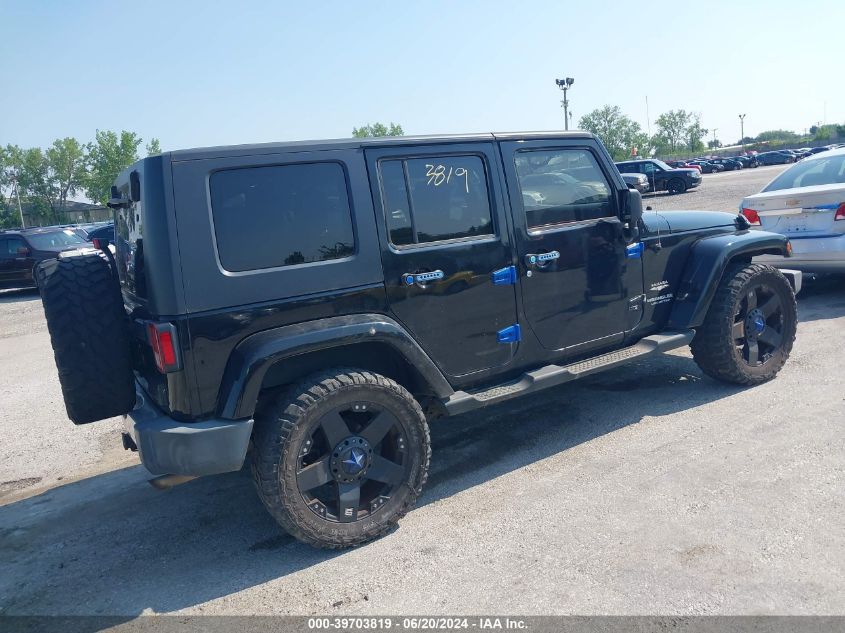 2008 Jeep Wrangler Unlimited Sahara VIN: 1J4GA59128L525599 Lot: 39703819