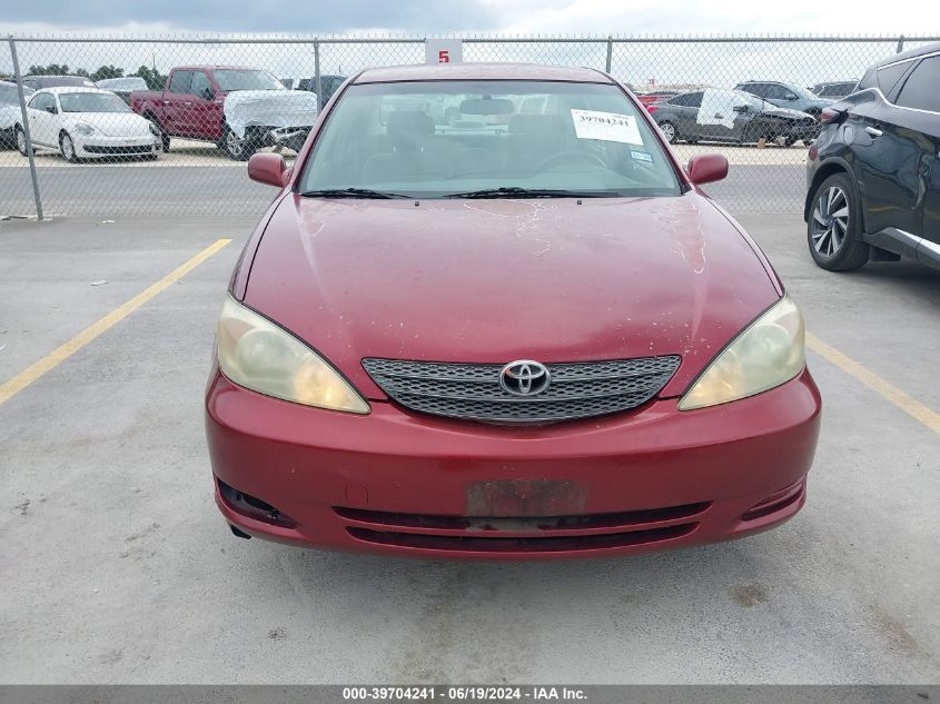 2004 Toyota Camry Le VIN: JTDBE32K240274705 Lot: 39704241