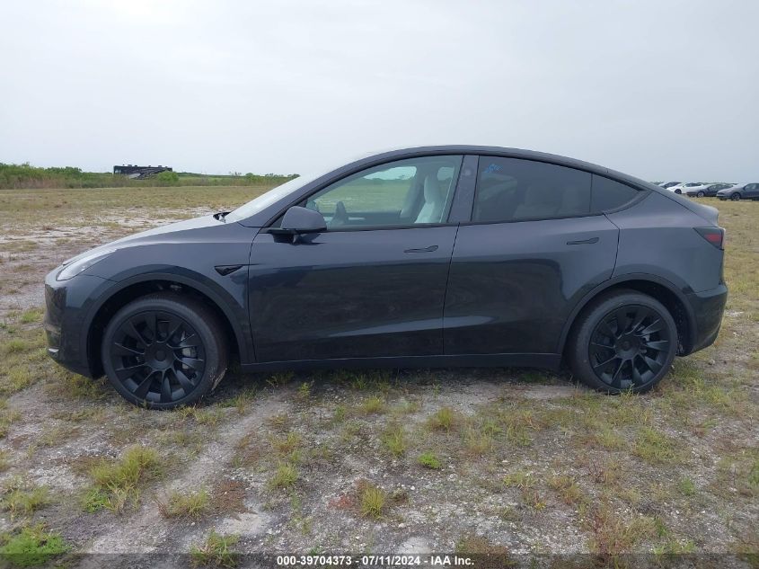 2024 Tesla Model Y Long Range/Rwd VIN: 7SAYGDEDXRF094584 Lot: 39704373