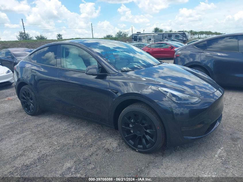 7SAYGDED4RF098999 2024 TESLA MODEL Y - Image 1