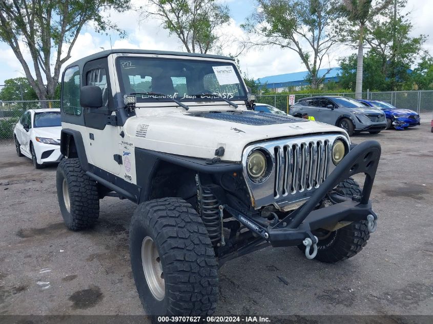 1998 Jeep Wrangler Sport VIN: 1J4FY19S0WP721409 Lot: 39707627