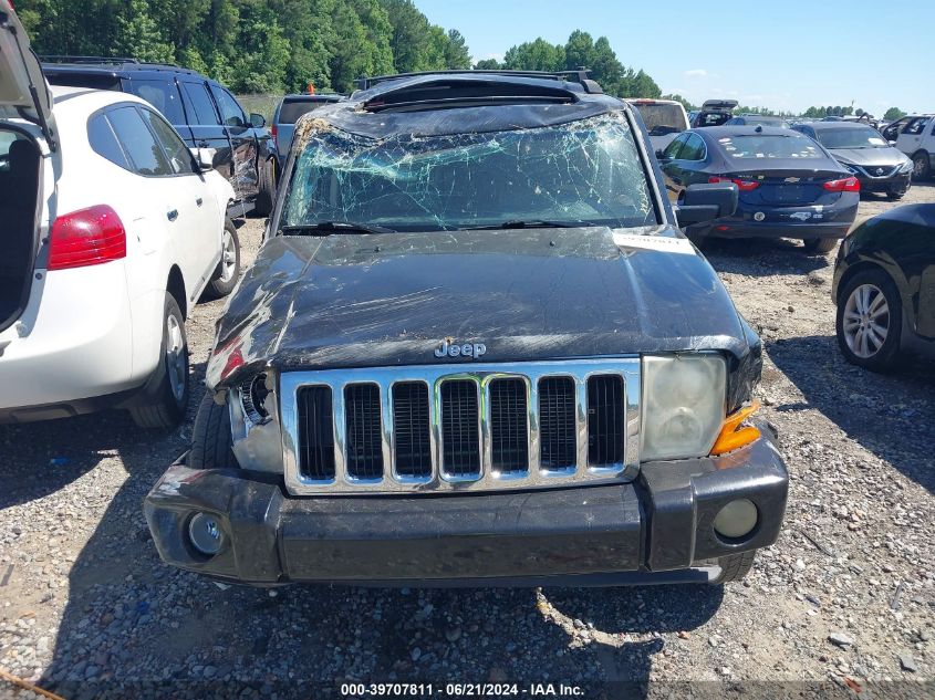 2007 Jeep Commander Sport VIN: 1J8HH48KX7C574129 Lot: 39707811