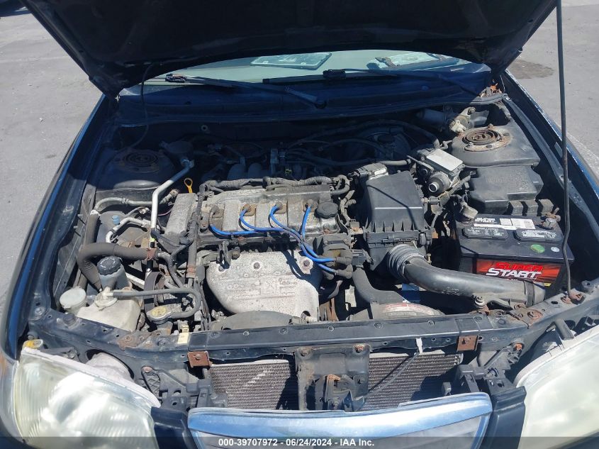 2000 Mazda 626 Es/Lx VIN: 1YVGF22C6Y5119681 Lot: 39707972