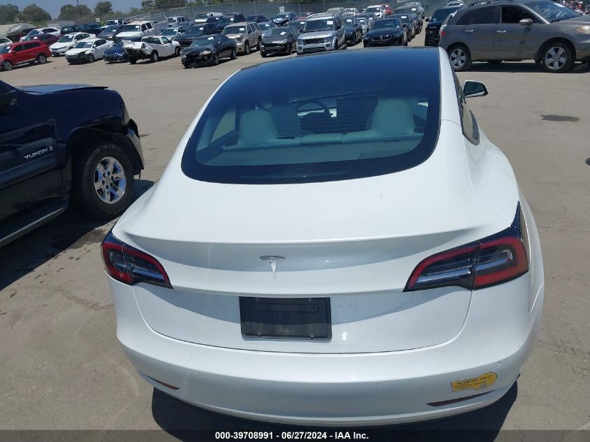 2021 Tesla Model 3 Standard Range Plus Rear-Wheel Drive VIN: 5YJ3E1EA9MF098023 Lot: 39708991