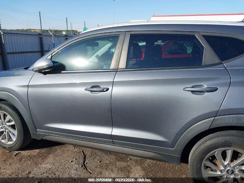 KM8J3CA24GU158143 2016 Hyundai Tucson