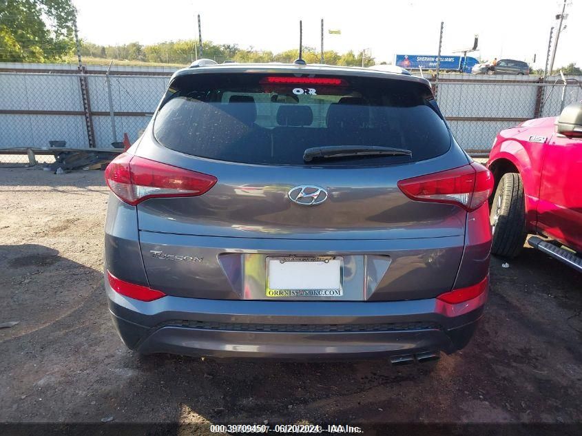 KM8J3CA24GU158143 2016 Hyundai Tucson