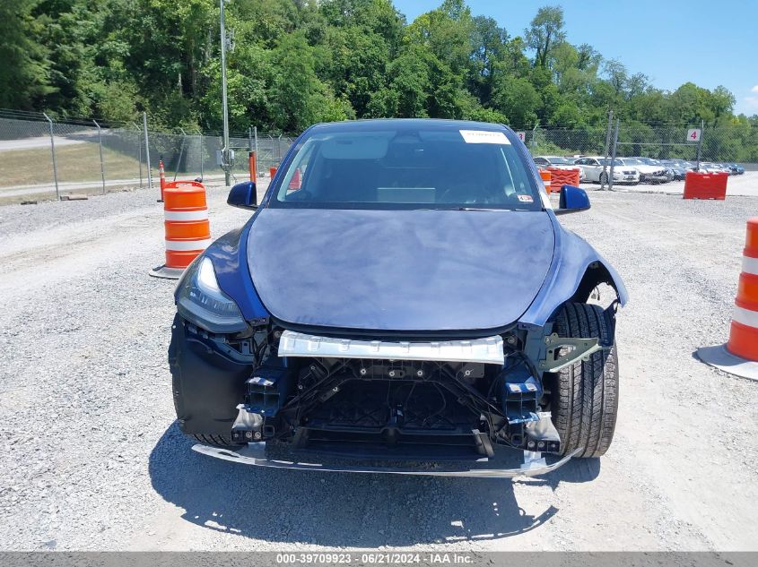 2023 Tesla Model Y Awd/Long Range Dual Motor All-Wheel Drive VIN: 7SAYGDEE2PA098261 Lot: 39709923