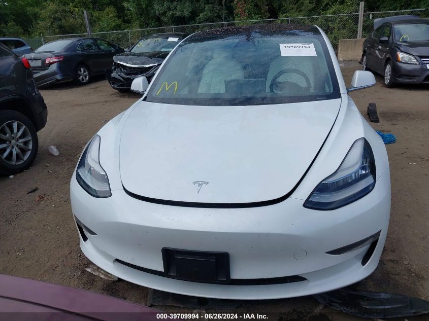 2018 Tesla Model 3 Long Range/Performance VIN: 5YJ3E1EB1JF101131 Lot: 39709994