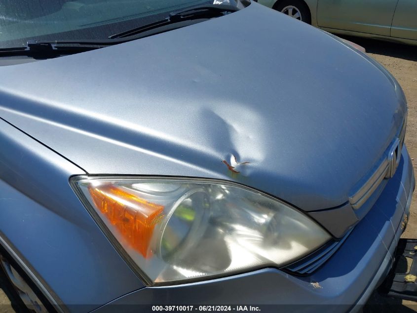 2007 Honda Cr-V Ex-L VIN: JHLRE48727C081225 Lot: 39710017