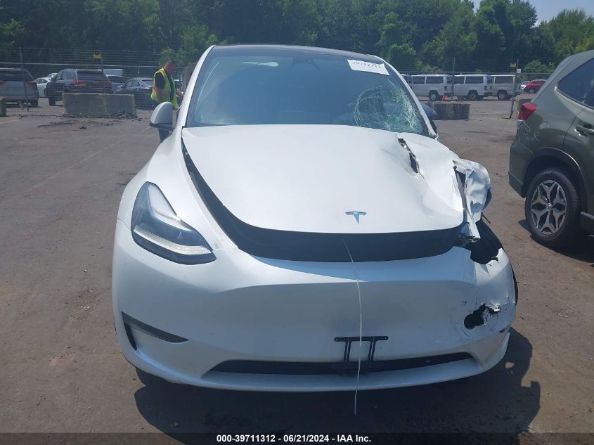 2023 Tesla Model Y Awd/Long Range Dual Motor All-Wheel Drive VIN: 7SAYGDEE7PF682853 Lot: 39711312