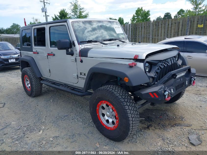 2007 Jeep Wrangler Unlimited X VIN: 1J4GA39167L112667 Lot: 39711563