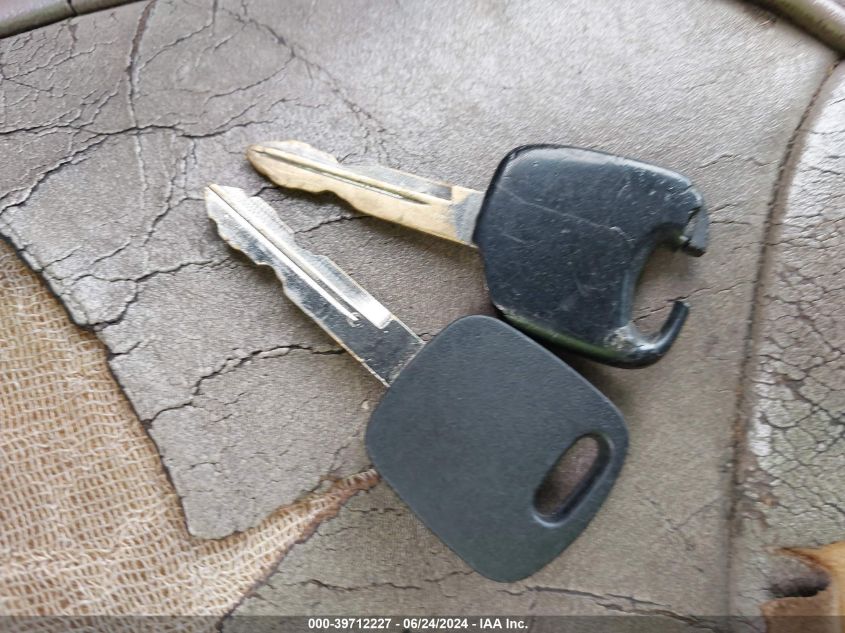 1999 Ford Crown Victoria Lx VIN: 2FAFP74WXXX184877 Lot: 39712227