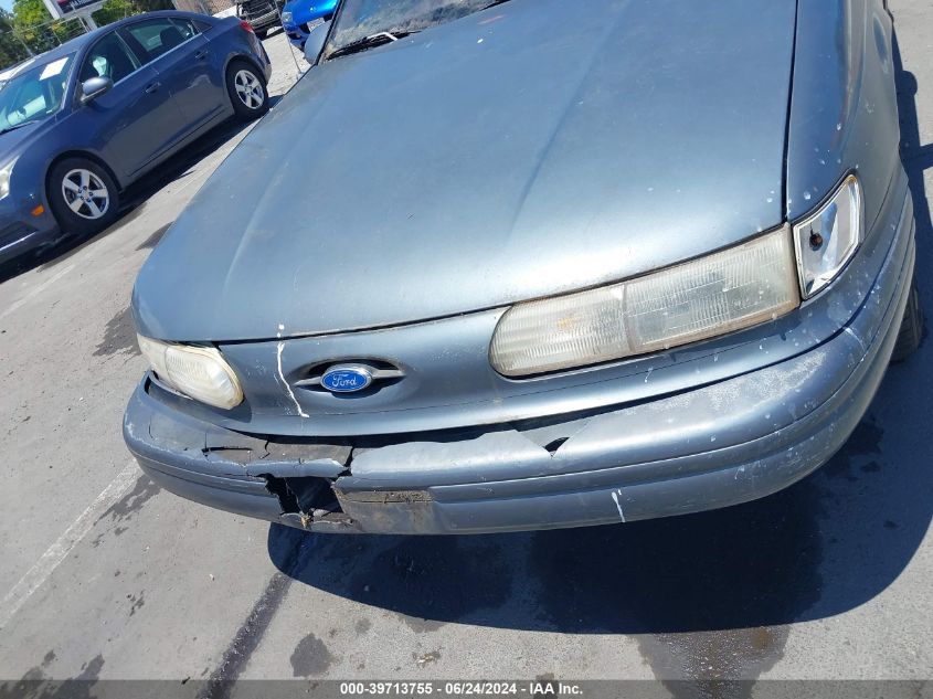 1994 Ford Taurus Gl VIN: 1FALP57U2RG188352 Lot: 39713755