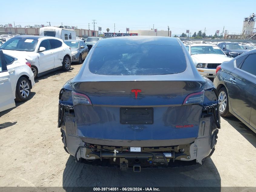 2023 Tesla Model Y Awd/Long Range Dual Motor All-Wheel Drive VIN: 7SAYGAEE9PF932494 Lot: 39714051