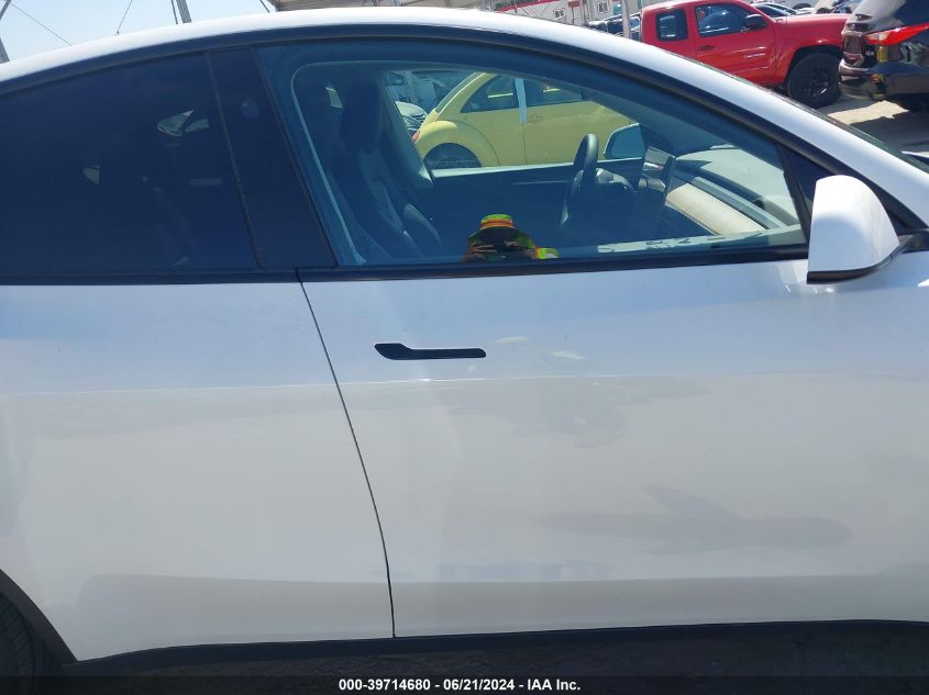 2023 Tesla Model Y Awd/Long Range Dual Motor All-Wheel Drive VIN: 7SAYGDEE3PF886615 Lot: 39714680