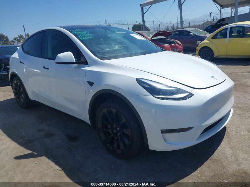 2023 Tesla Model Y Awd/Long Range Dual Motor All-Wheel Drive VIN: 7SAYGDEE3PF886615 Lot: 39714680