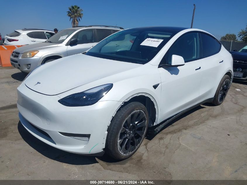 2023 Tesla Model Y Awd/Long Range Dual Motor All-Wheel Drive VIN: 7SAYGDEE3PF886615 Lot: 39714680