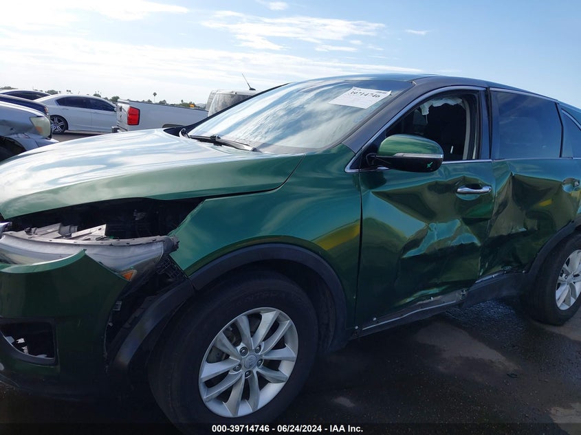 2018 Kia Sorento 2.4L L VIN: 5XYPG4A35JG344655 Lot: 39714746