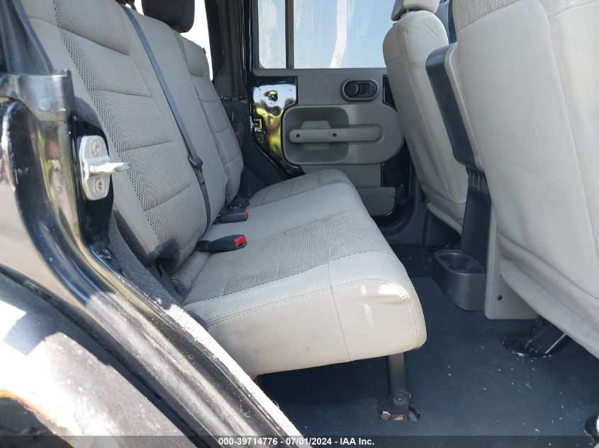 2007 Jeep Wrangler Unlimited Sahara VIN: 1J4GA591X7L194253 Lot: 39714776