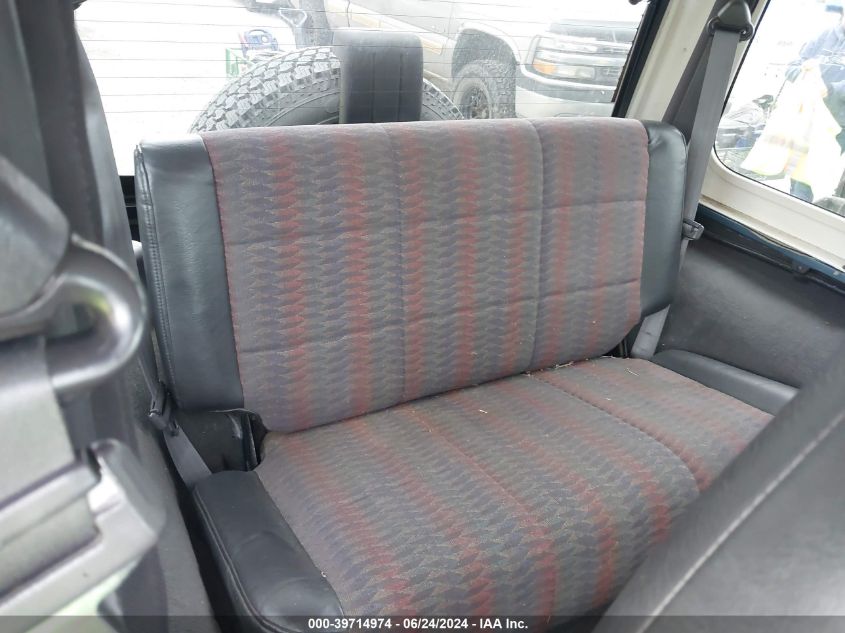 1999 Jeep Wrangler Sport VIN: 1J4FY19S5XP469674 Lot: 39714974