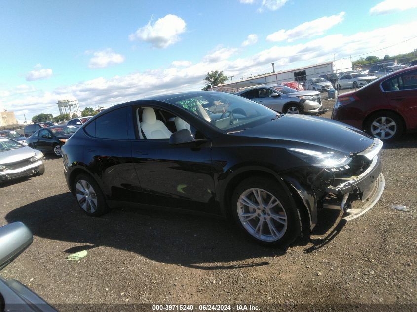 2023 Tesla Model Y VIN: 7SAYGDEE1PF801951 Lot: 39715240