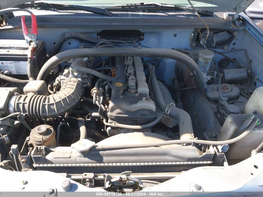 1999 Chevrolet Tracker VIN: 2CNBJ13C4X6911933 Lot: 39715726