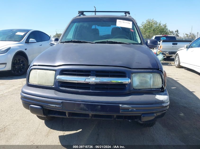 1999 Chevrolet Tracker VIN: 2CNBJ13C4X6911933 Lot: 39715726