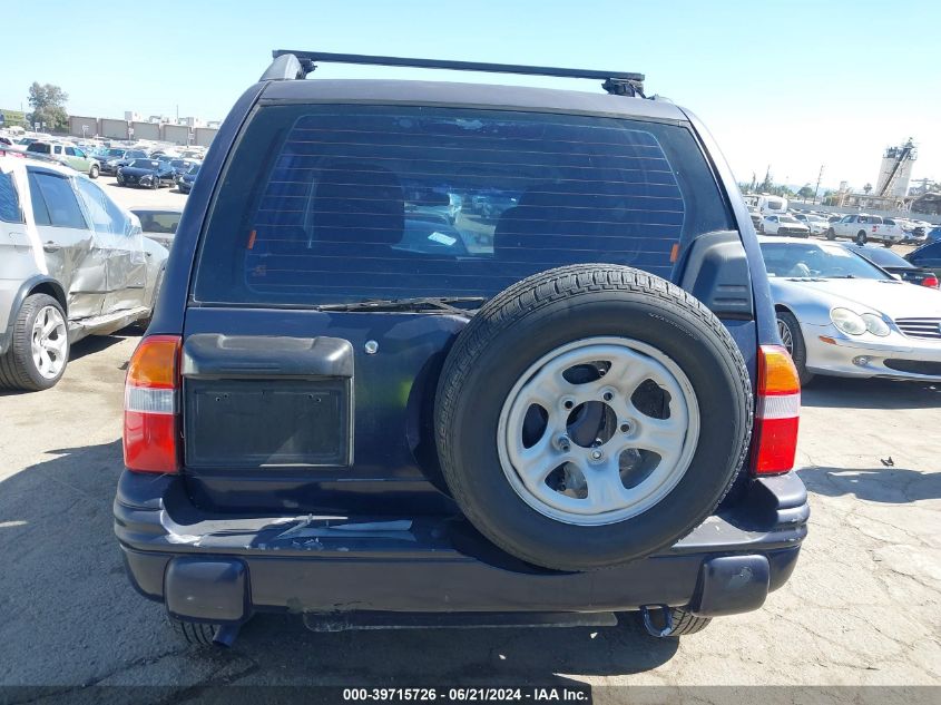 1999 Chevrolet Tracker VIN: 2CNBJ13C4X6911933 Lot: 39715726