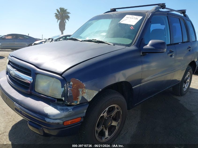 1999 Chevrolet Tracker VIN: 2CNBJ13C4X6911933 Lot: 39715726