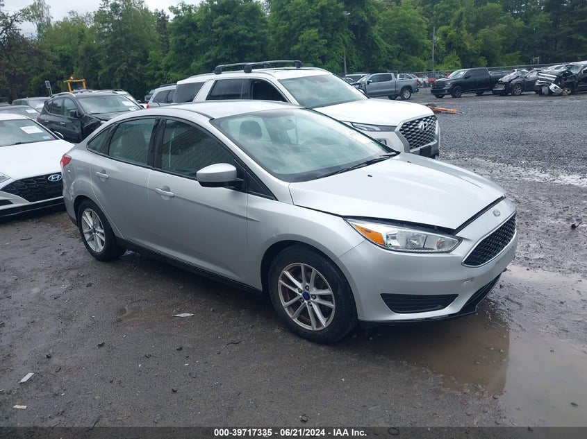 2018 Ford Focus Se VIN: 1FADP3F20JL233891 Lot: 39717335