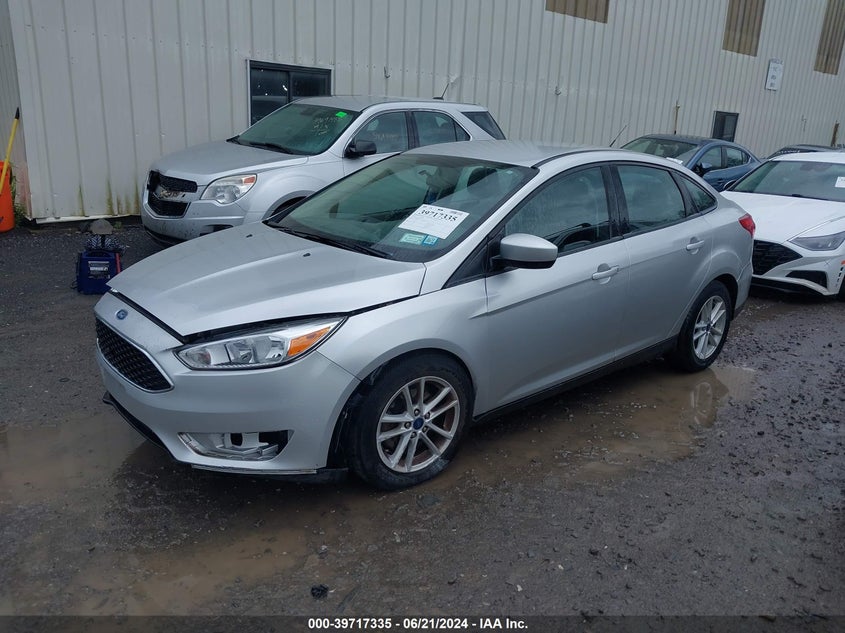 2018 Ford Focus Se VIN: 1FADP3F20JL233891 Lot: 39717335