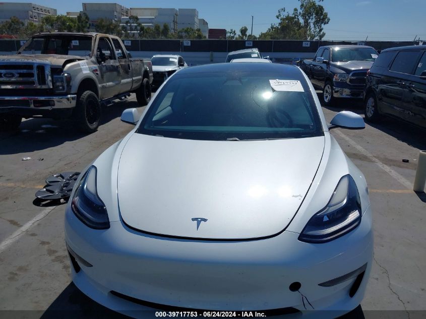 2021 Tesla Model 3 Standard Range Plus Rear-Wheel Drive VIN: 5YJ3E1EA0MF996509 Lot: 39717753