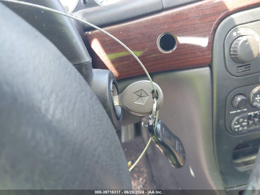 1999 Chrysler Lhs VIN: 2C3HC56G4XH590130 Lot: 39718317