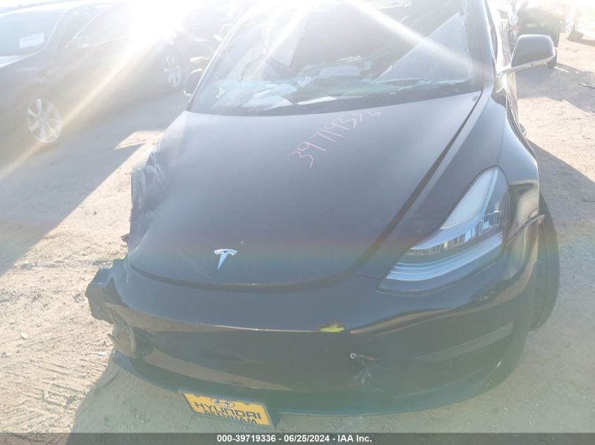 2019 Tesla Model 3 VIN: 5YJ3E1EA2KF409899 Lot: 39719336