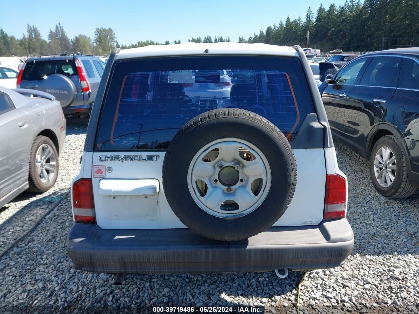 1998 Chevrolet Tracker VIN: 2CNBJ1360W6921786 Lot: 39719486