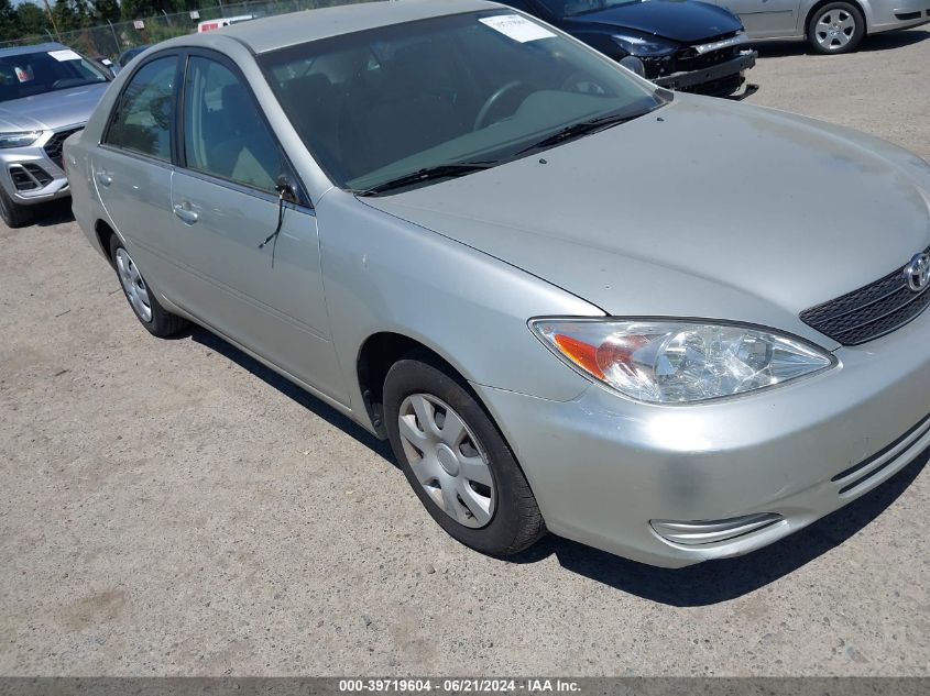 2003 Toyota Camry Le VIN: JTDBE32K330143667 Lot: 39719604