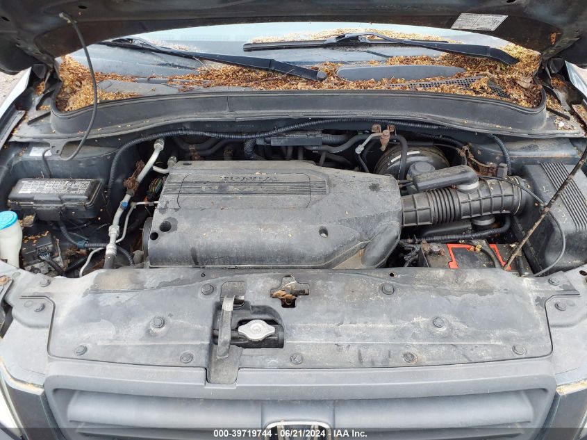 2004 Honda Pilot Ex-L VIN: 2HKYF18614H557718 Lot: 39719744