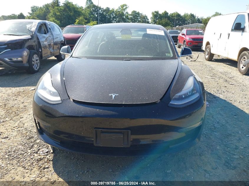 5YJ3E1EAXJF004954 2018 Tesla Model 3 Long Range/Mid Range