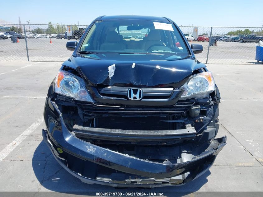 2008 Honda Cr-V Lx VIN: 3CZRE38318G704265 Lot: 39719789