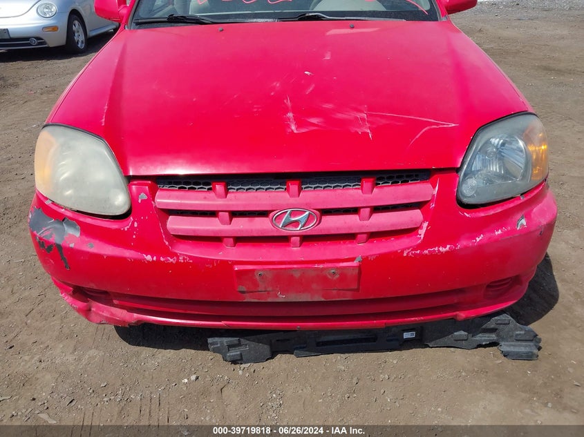 2005 Hyundai Accent Gls VIN: KMHCG45C75U592981 Lot: 39719818